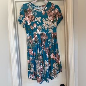 Teal short sleeve dress with cream and pink flowers.